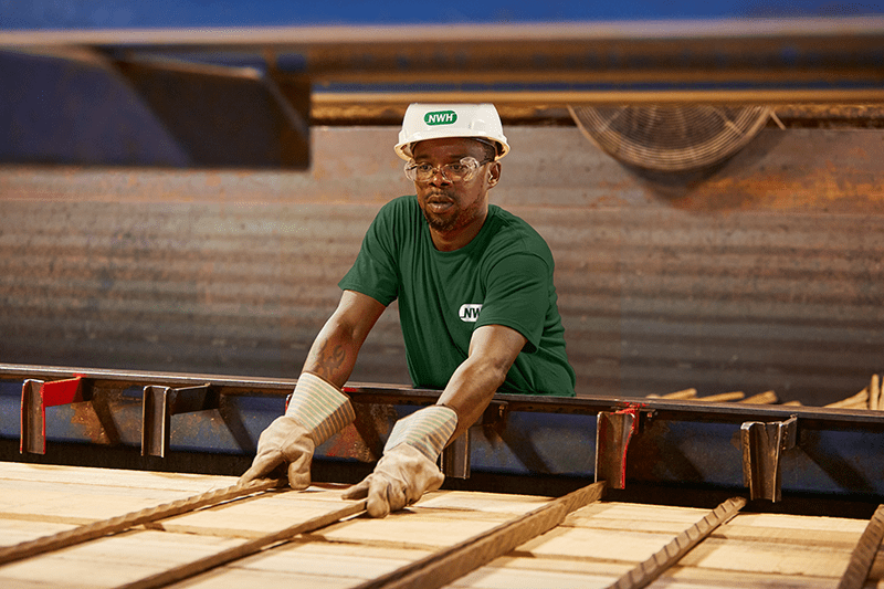 Stacking Lumber in Mill